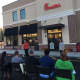 Campers at the new Chick-Fil-A take part in a game that is part scavenger hunt and part musical chairs as part of the First 100 campout at the Norwalk restaurant.