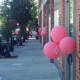 Pink balloons line the storefronts Thursday for the Go For Pink even in Greenwich.