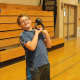 An Irvington Middle School student working out with a kettlebell during fitness boot camp.