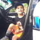 Ethan, 5, gets to see the inside of a Paramus police car.