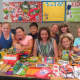 Janet Singer from the DCF in Bridgeport and Royle students with the school supplies they collected