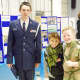 Cadet Master Sergeant Brian Kelleher, pictured with two kids at the open house for Civil Air Patrol’s Putnam County Composite Squadron.