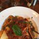 Osteria Romana's homemade pappardelle is smothered in a meat-based bolognese sauce.