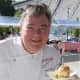 Peter Kelly, Chef/Owner of Xaviar’s Restaurant Group, at the Wine & Food Festival's popular burger and beer blast.
