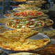 Pizza Mania in Garfield serves a wide variety of specialty pizzas.