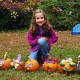 Pumpkin painting is a continuing tradition at the Fall Festival.