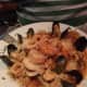 Calamari, mussels and shrimp are piled atop pasta at Ragazzi, known for its generous portions.