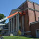 Workers finished off a new roof this summer at Bassick High School. 