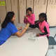 Stamford Public Education Foundation students work on projects with an instructor.