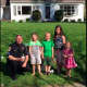 Bethel Police Officer Michael McKinney chats with kids on a recent warm evening.