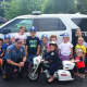 Saddle Brook police officer Christopher Stanton surprised Andrew, 4, at his police-themed birthday party