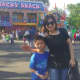 Linda Weng with her 7-year-old son Matthew have been coming to the carnival for three years.