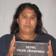 Dilsa Collado, 43, of Nashville Road, Bethel is charged with stealing packages out of mailboxes.