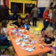 Kids make a craft project at Holly Pond School's Family Fun Day.