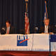 Himes and Shaban engage in the debate at Wilton High School.