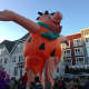 The Fred Flintstone balloon is one of the first balloons inflated Saturday before the UBS Parade Spectacular on Sunday.