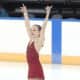 Emilia Murdock of Darien takes her bows before receiving her silver medal in the Intermediate Ladies competition of the U.S. Figure Skating Association on Sunday in Kansas City, Mo.