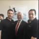 From left, George Pertesis, Norwalk Mayor Harry Rilling, and John Pertesis, at the grand opening and Ribbon cutting to The Simple Greek.