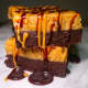 Chocolate Peanut Butter Bars with a caramel and chocolate drizzle from Marc's Cheesecake in Glen Rock.