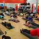 Belton packs the group fitness room for "ab attack."