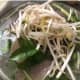 A photo of a bowl of pho from Pho 34, topped with bean sprouts