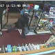 The two suspects fled on foot after stealing money from the cash register.