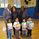 Each Tracey Elementary School student got a free copy of "Lola at the Library."