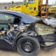 A parked New York State Police car was struck by a Freightliner box truck on Tuesday, Nov. 30.