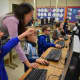 Jessie Yu  puts third-graders through their paces at the Dows Lane Elementary School in Irvington during the district's recent "Hour of Code" event.