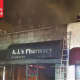 A.J.'s Pharmacy, where responders said the fire began.