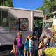 Kids flock to the Sweet Ice Queen truck in Wayne.