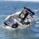 A boat sinks in Long Island Sound off the coast of Rye Playland.