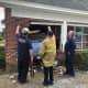 The fire department's collapse crew assessing the home a 2006 Chrysler RT Cruiser was pulled out of in the 1000 block of Columbia Avenue Lancaster, Pennsylvania.