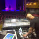 Wall Street Theater Artistic Director Billy Blanks, Jr. checks the sound while the Teen Theater Program rehearses.