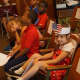 Students wear patriotic colors for Monday's Flag Day ceremony at Daniel Webster Elementary School.