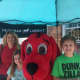 Clifford joins a family for a picture at the festival.