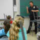 Ken Ross, Chief of the Putnam County SPCA, talks to Girl Scouts about animal cruelty.