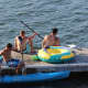 Lucas Salem left, Brian Murphy (center) and Jackson Solis enjoy their time on the water.