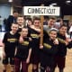 Norwalk Mad Bulls wrestlers carry the Connecticut banner at the Eastern Nationals wrestling competition in Salisbury, Md.