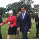 Lt. Gov. Nancy Wyman and Gov. Dannel Malloy prepare to place flowers at the state memorial at Sherwood Island State Park in Westport.