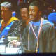 Westchester Community College Student Governement President Taje Champagnie speaks at the 65th commencement at the County Center.