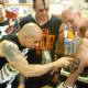 Danny from Dobbs Ferry, right, shows off a Misfits skull logo tattoo at the Clockwork Records signing.