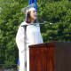 Wilton High School Class of 2013 Valedictorian Paige Wallace addresses her classmates during Saturday's graduation ceremony.