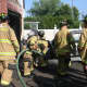 New Canaan Fire Company puts out a blaze at AC Auto Body & Mechanic at about 5 p.m. Monday.