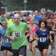 Jeff Saland of Hastings (360) leads a pack of runners at the Dobbs Ferry Labor Day 5-Kilometer race.
