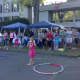 Fans of Hello Yoga tried the hula hoop at the anniversary celebration.