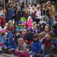 Children watch a show at the Rye Chamber of Commerce Mistletoe Magic festival.