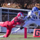 Darien's Nick Lombardo pulls in a pass near the goal line against New Canaan during their game on Thanksgiving. The teams meet again on Saturday in Stamford for the Class L championship.