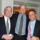 Jeff Kelly, Jake Fay and Willy Mann attend the holiday party.