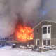 The fast moving fire engulfed the home by the time firefighters arrived.